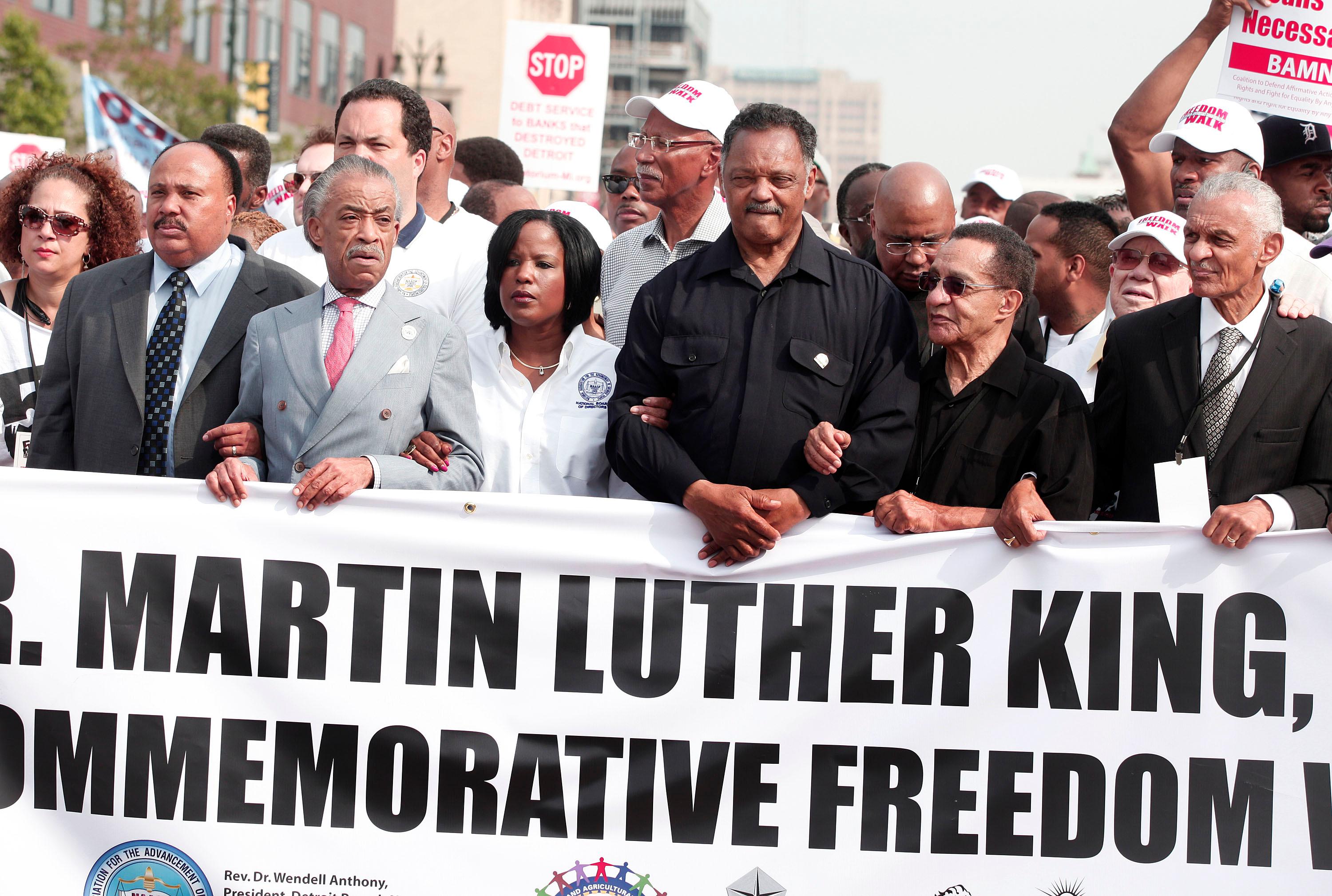 Marchers Commemorates 50th Anniversary Of MLK's Freedom March In Detroit