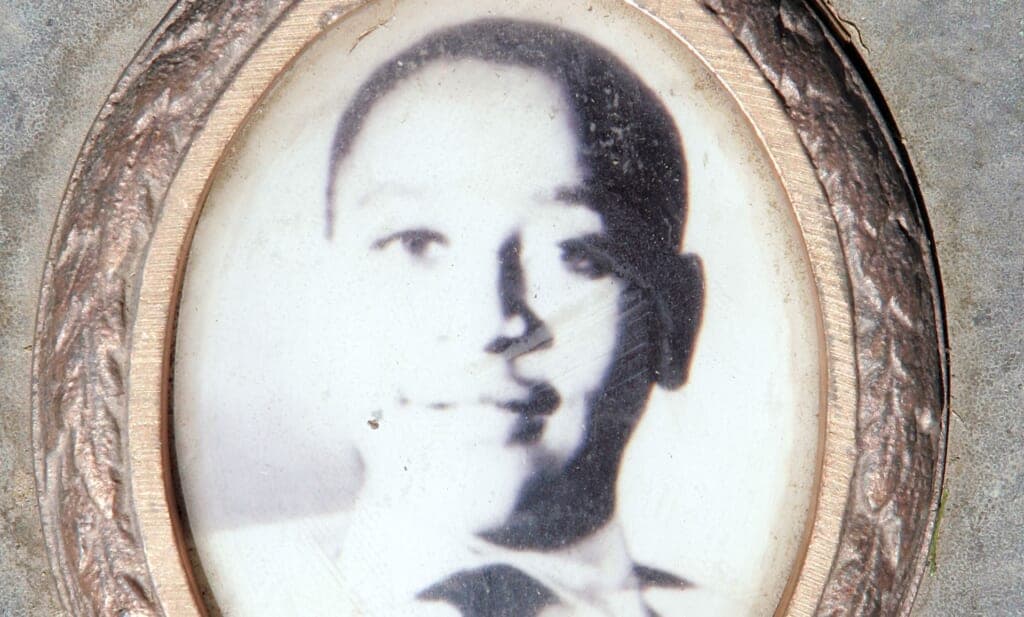 A photo of Emmett Till from the plaque on his gravesite