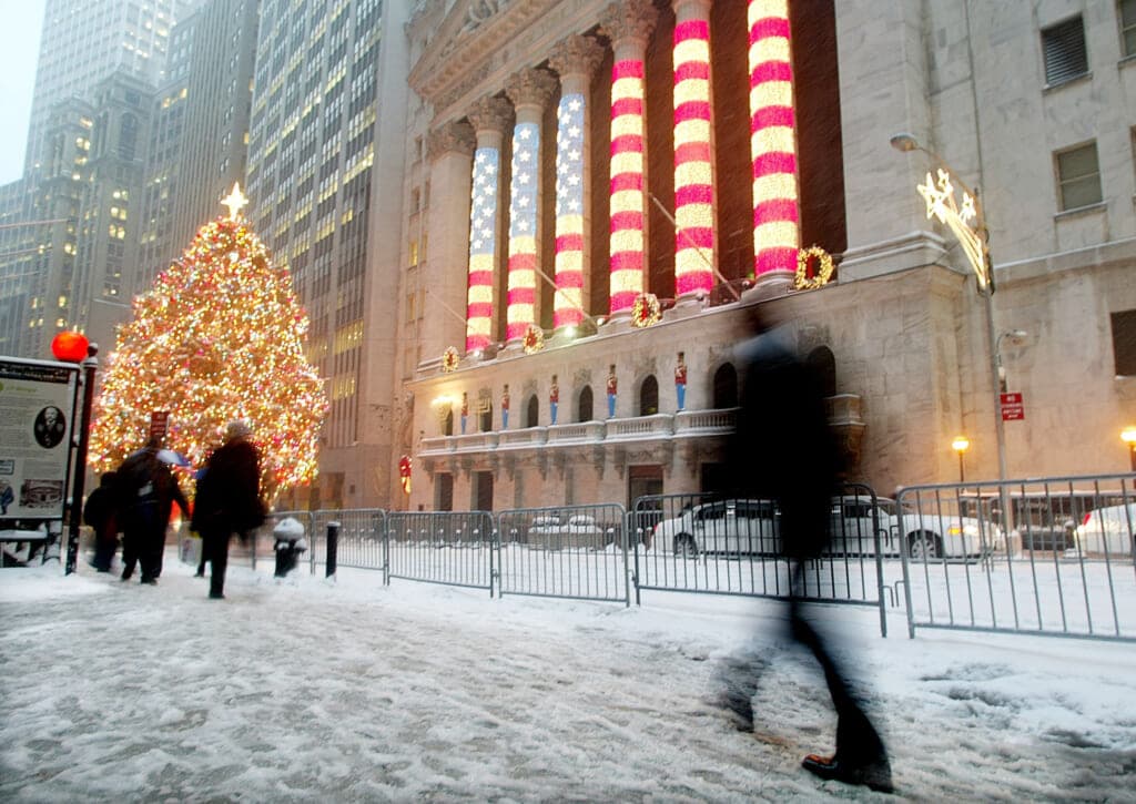 Snow-covered sidewalks and Christmas lights in New York