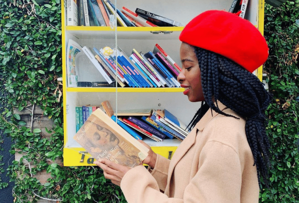 Poet Amanda Gorman reading a book