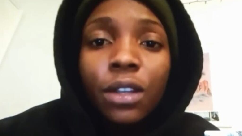 Berlinda Nibo wearing a black hoodie