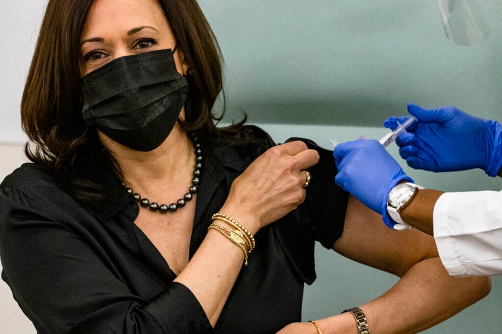 Registered Nurse Patricia Cummings administers the Moderna COVID-19 vaccine to Vice President Kamala Harris