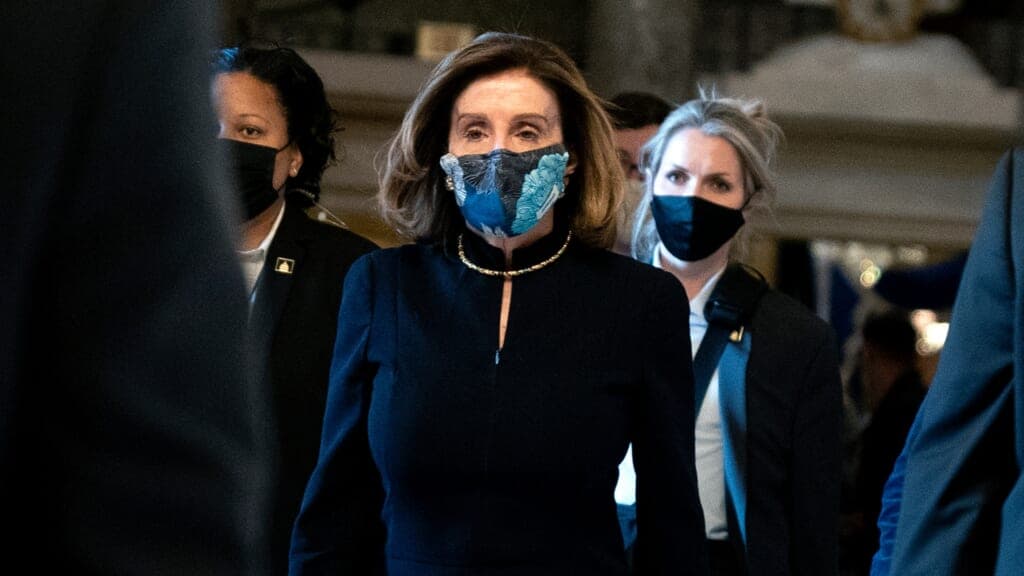 Speaker of the House Nancy Pelosi (center)