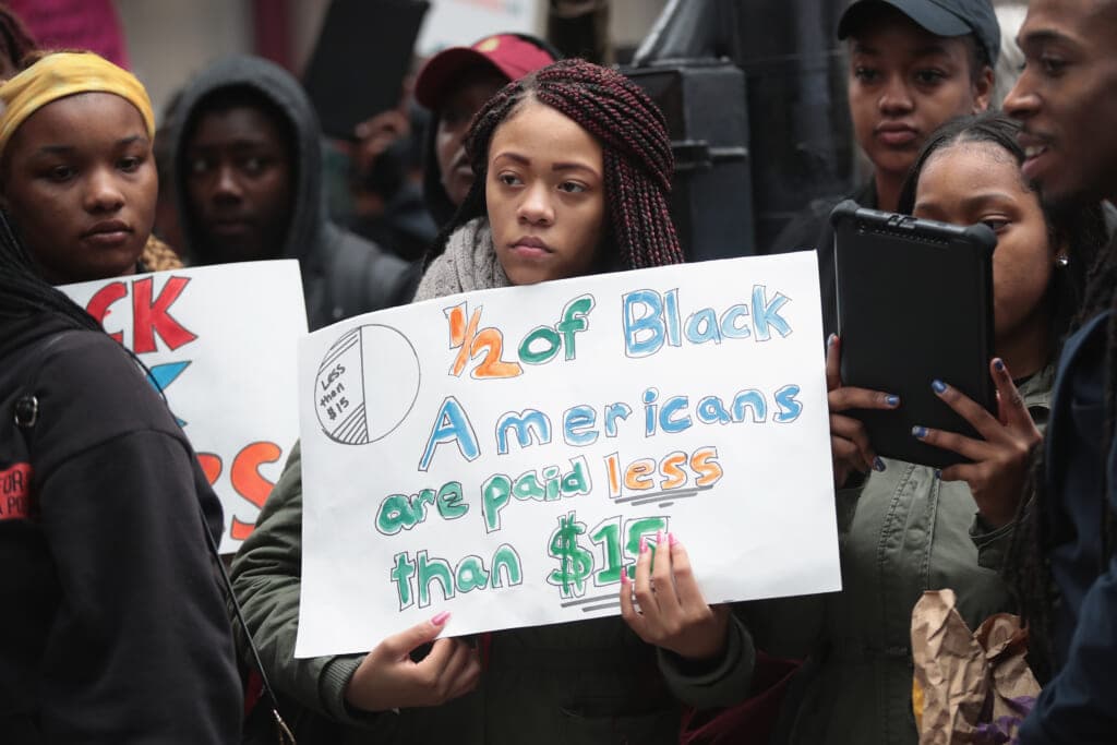 Demonstrators protest for higher wages and better working conditions