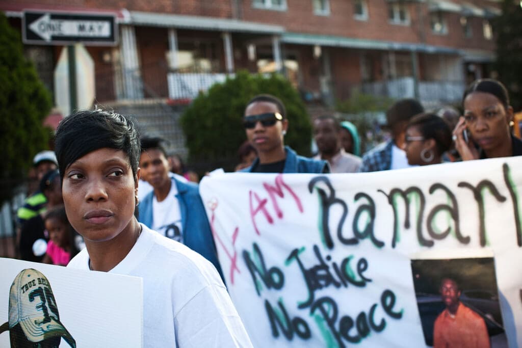 Constance Malcolm, mother of Ramarley Graham, leads a march