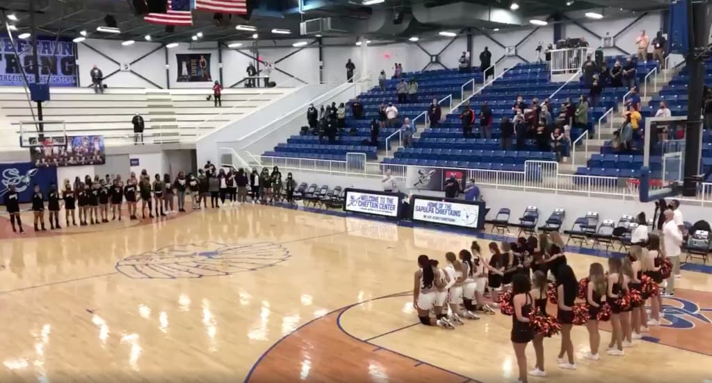 Norman High School basketball players on the court