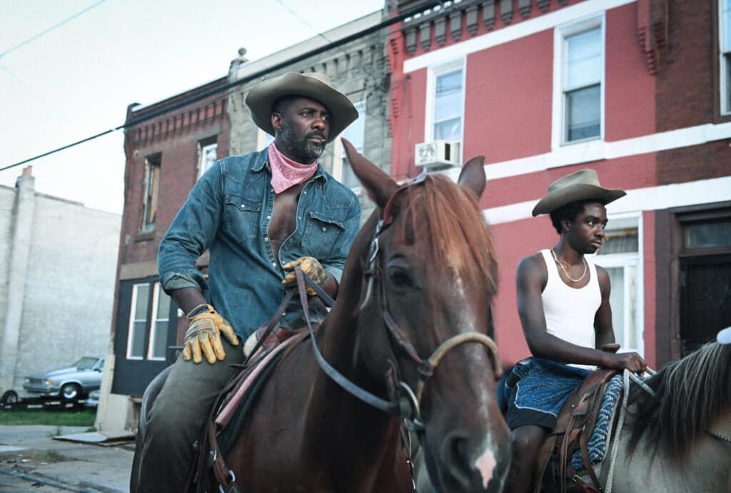 Actors Idris Elba and Caleb McLaughlin in "Concrete Cowboy"