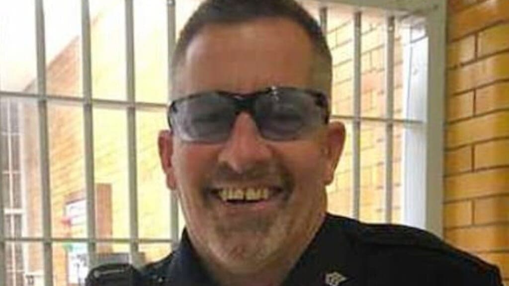 Sgt. Paul Gorder of Minnesota near prison bars