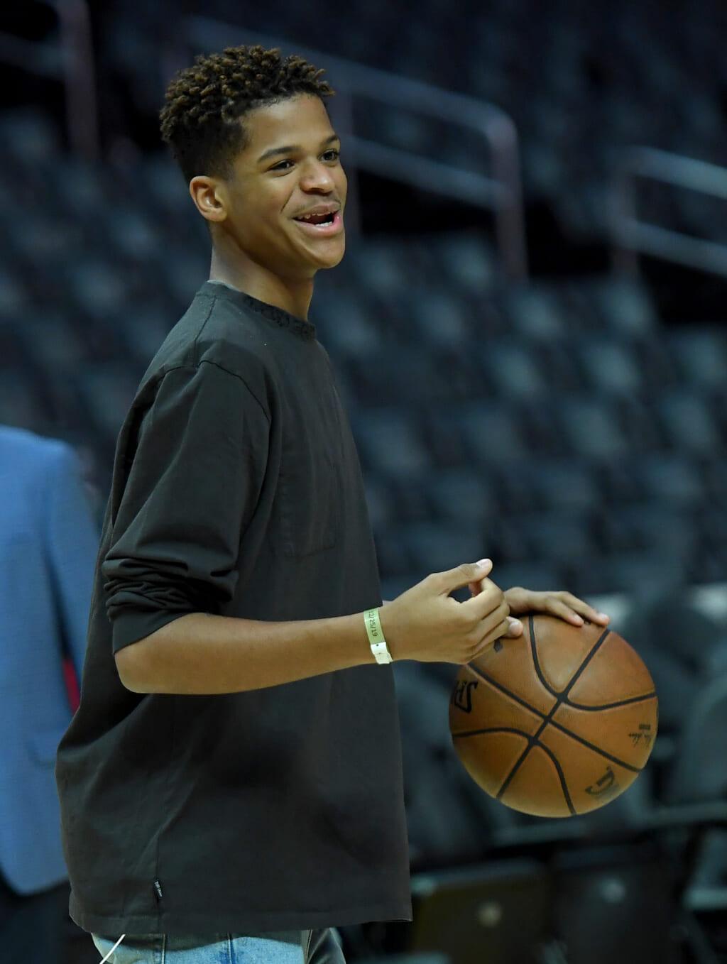 Shaqir O’Neal, son of former NBA player Shaquille O’Neal, holding a basketball