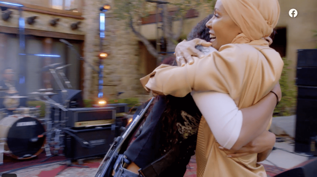 Co-host of the Red Table Talk Willow Smith hugs her mother, actor Jada Pinkett Smith