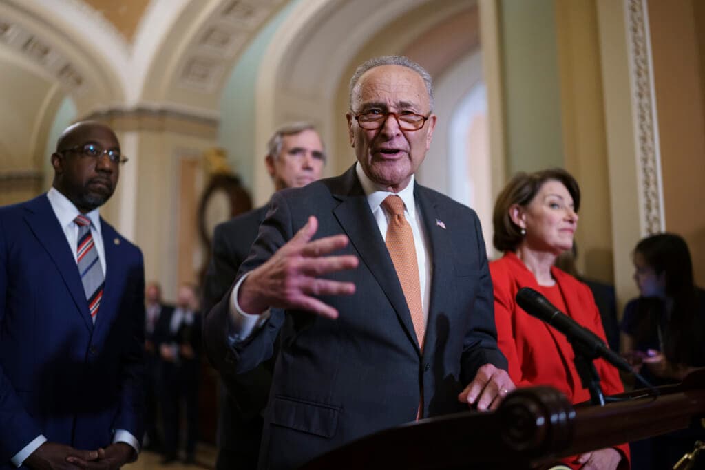Sen. Raphael Warnock, D-Ga., Senate Majority Leader Chuck Schumer, D-N.Y. and Sen. Amy Klobuchar, D-Minn.