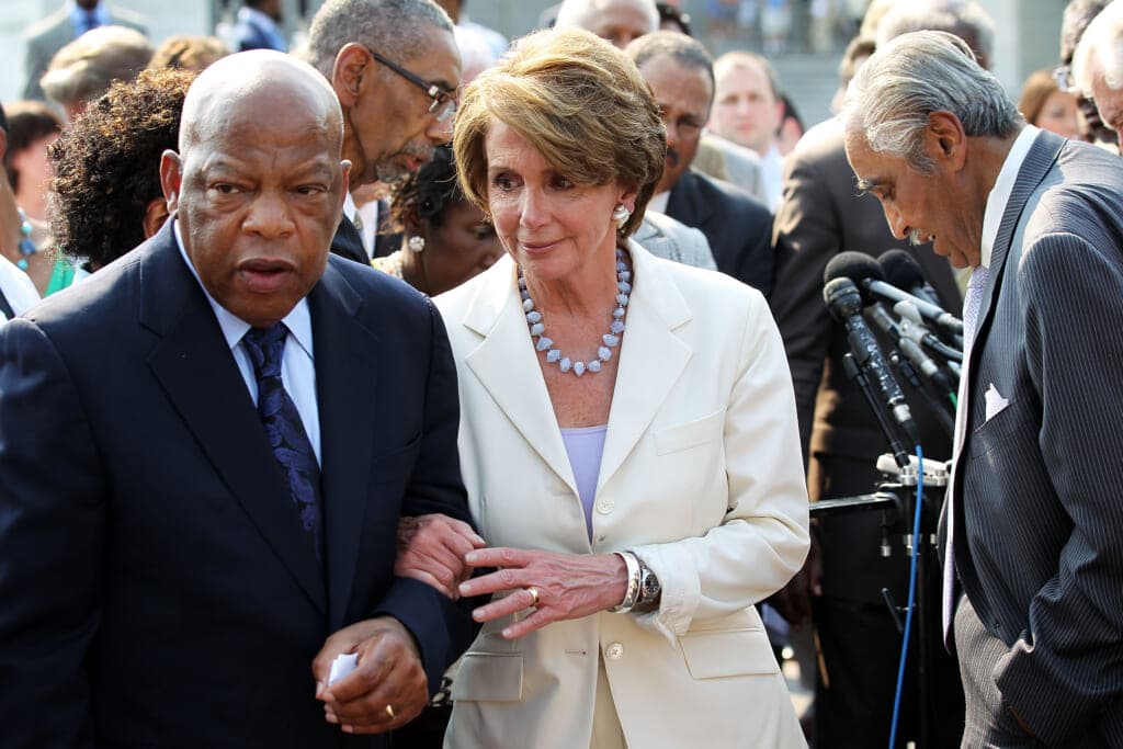 Rep. John Lewis (D-GA)  escorts House Minority Leader Rep. Nancy Pelosi (D-CA) 