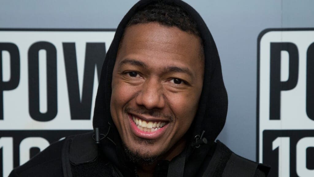 Actor and television host Nick Cannon, wearing a black hoodie