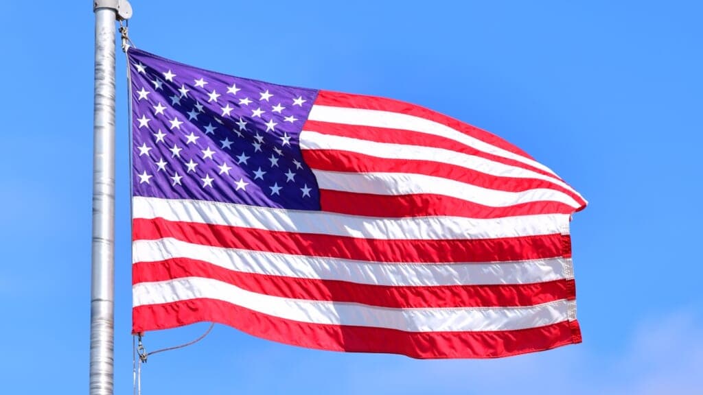 An American flag flying on a flagpole