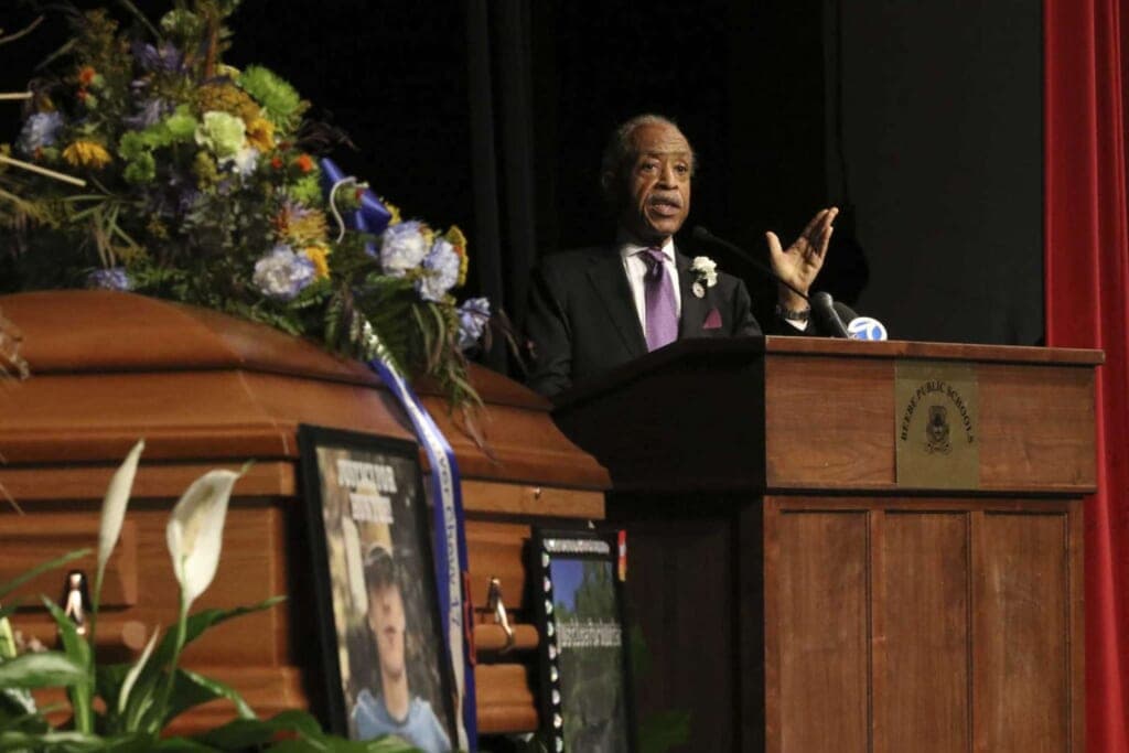 Reverend Al Sharpton gives the eulogy during the funeral service for 17-year-old Hunter Brittain