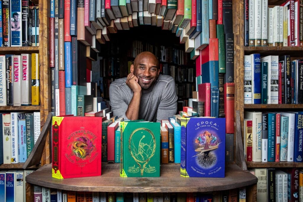 Kobe Bryant among shelves of books