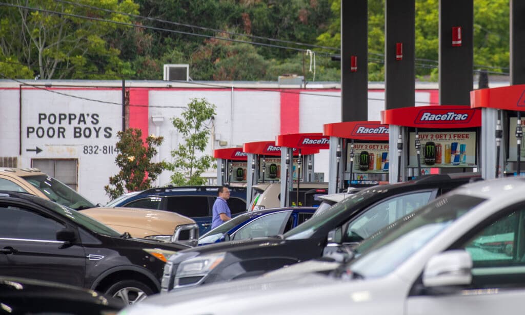 Long lines are seen at a gas station in Jefferson, Louisiana