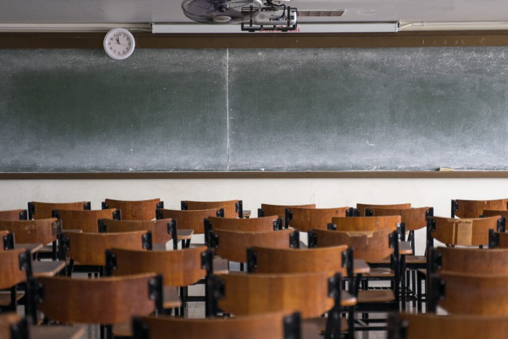 Empty desks in a classroom