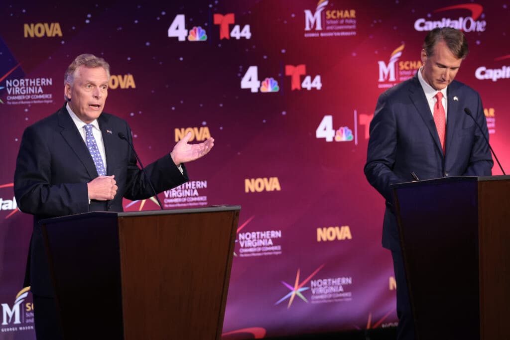 Former Virginia Gov. Terry McAuliffe (D-VA) (L) debates Republican gubernatorial candidate Glenn Youngkin