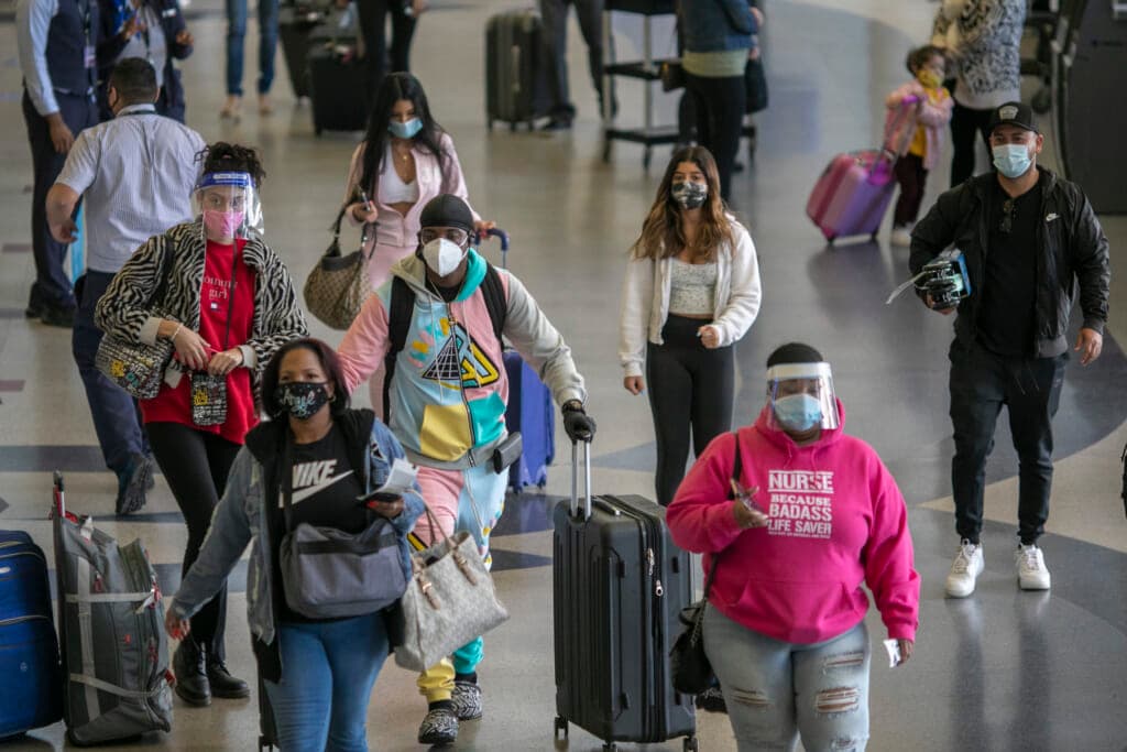 Holiday travelers at airport