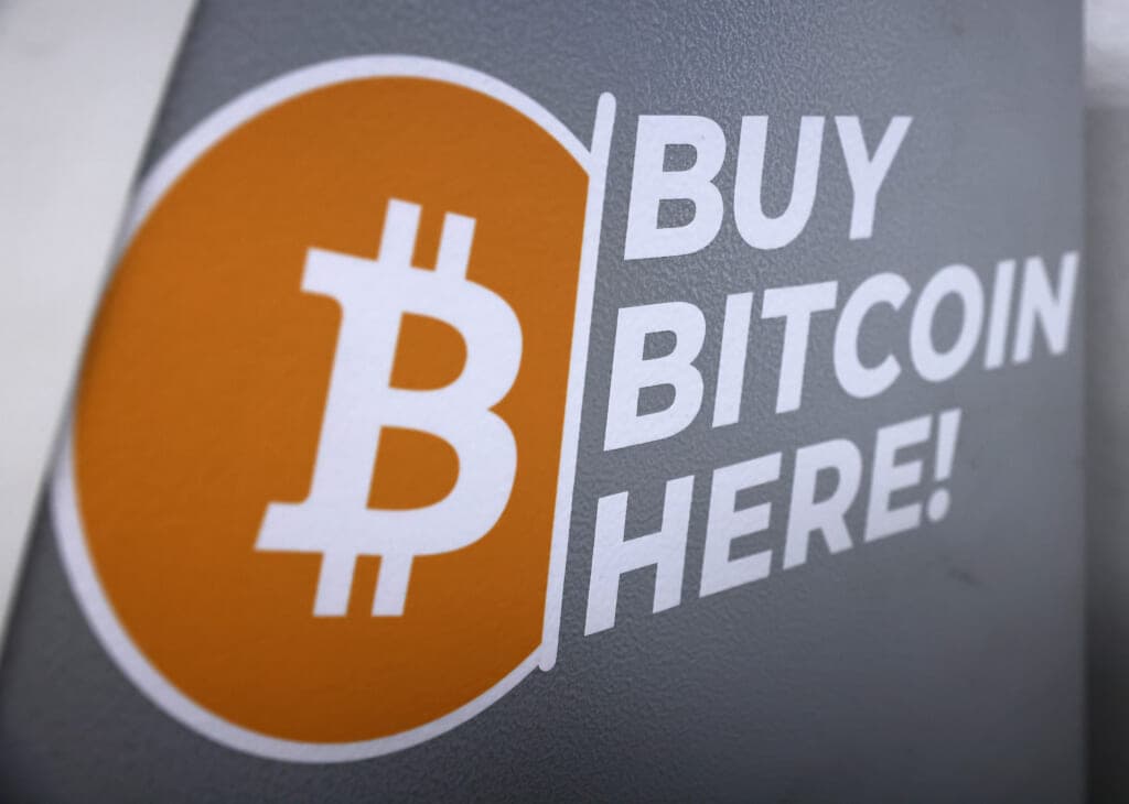 The Bitcoin logo on the side of a Bitcoin ATM