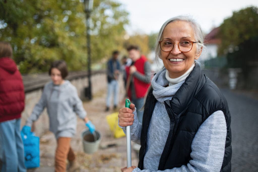 Volunteers help clean an area