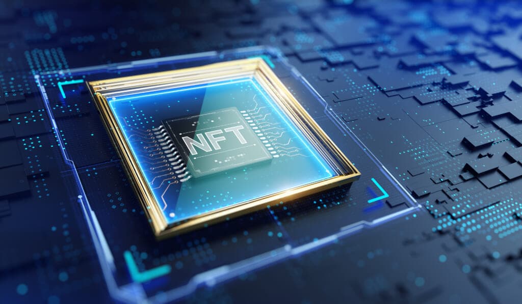 A glowing computer chip reading "NFT" on a circuit board