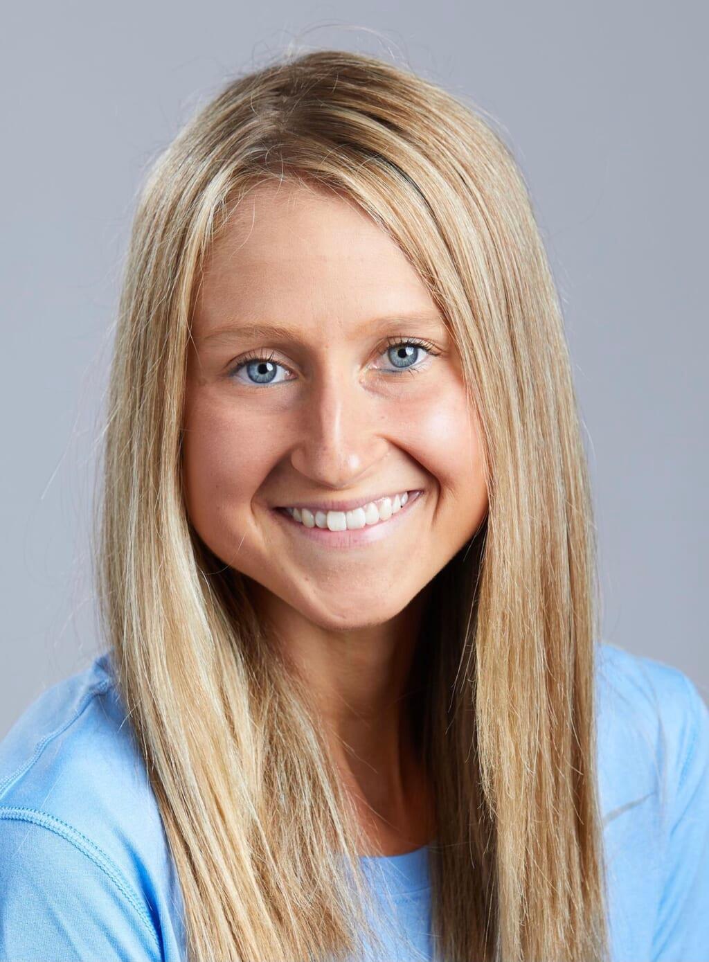 Political reporter Jeannie Michele Kopstein wearing a blue shirt