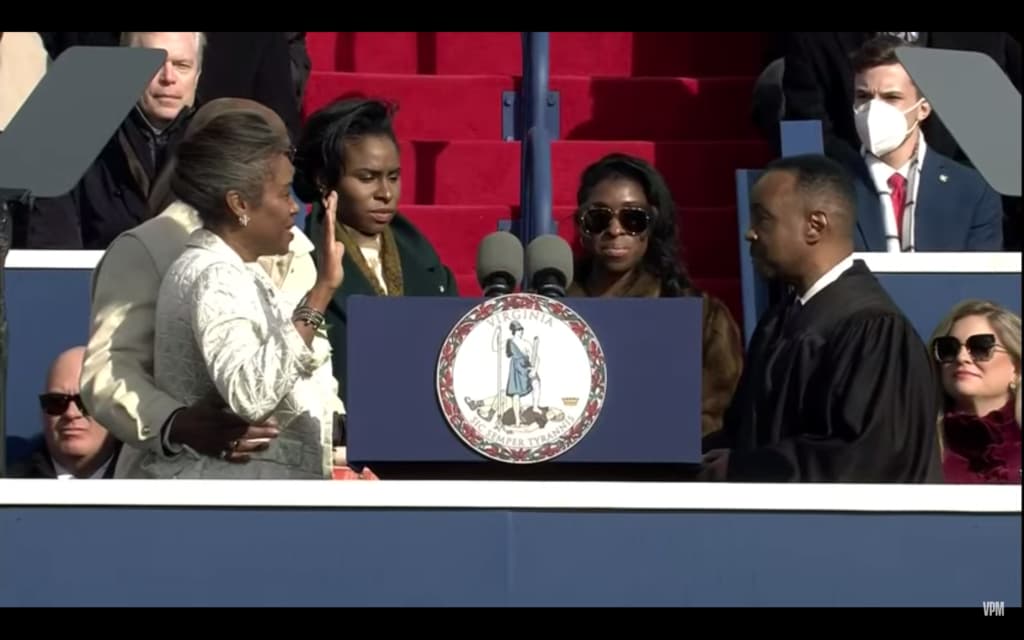 Republican Lieutenant Governor Winsome Sears of Virginia raises her hand as she is sworn into office