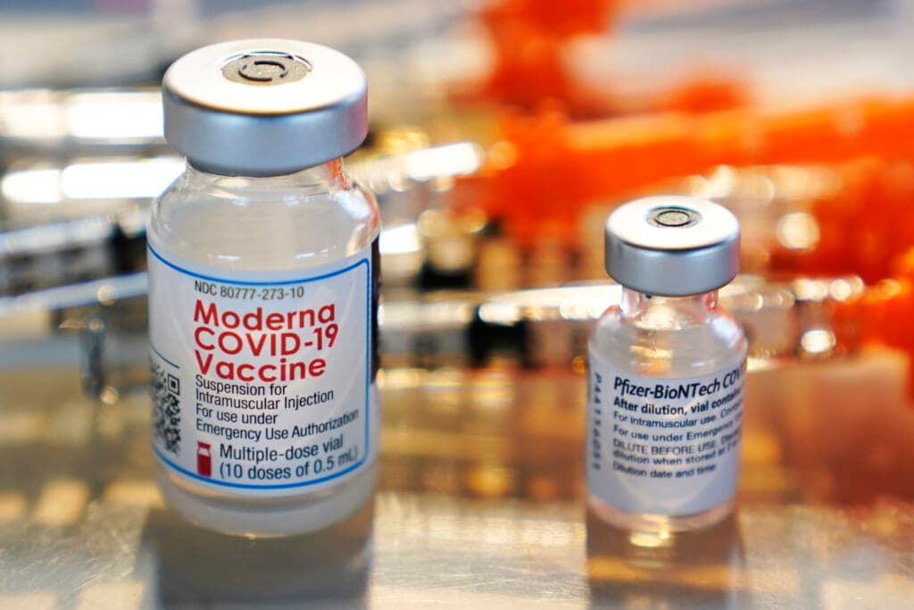 Vials for the Moderna and Pfizer COVID-19 vaccines