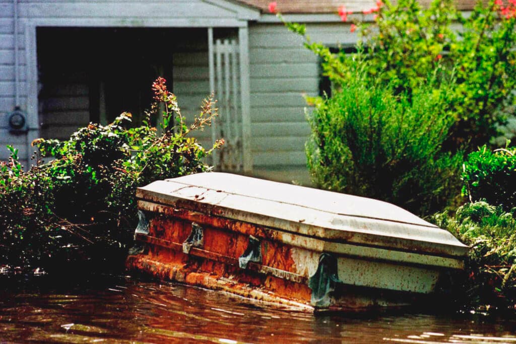 A casket floats in a flooded yard in Princeville, N.C.,