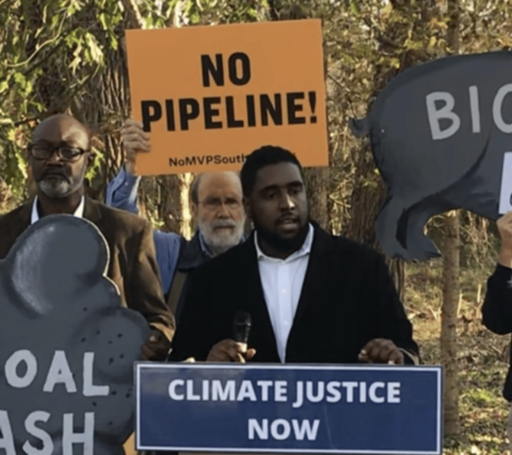 William J. Barber III, director of environmental and climate justice for the Climate Reality Project, in a black jacket