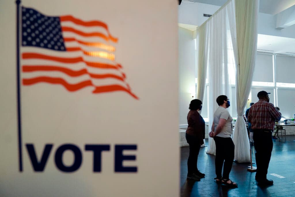 People wait in line to vote in Georgia’s primary election