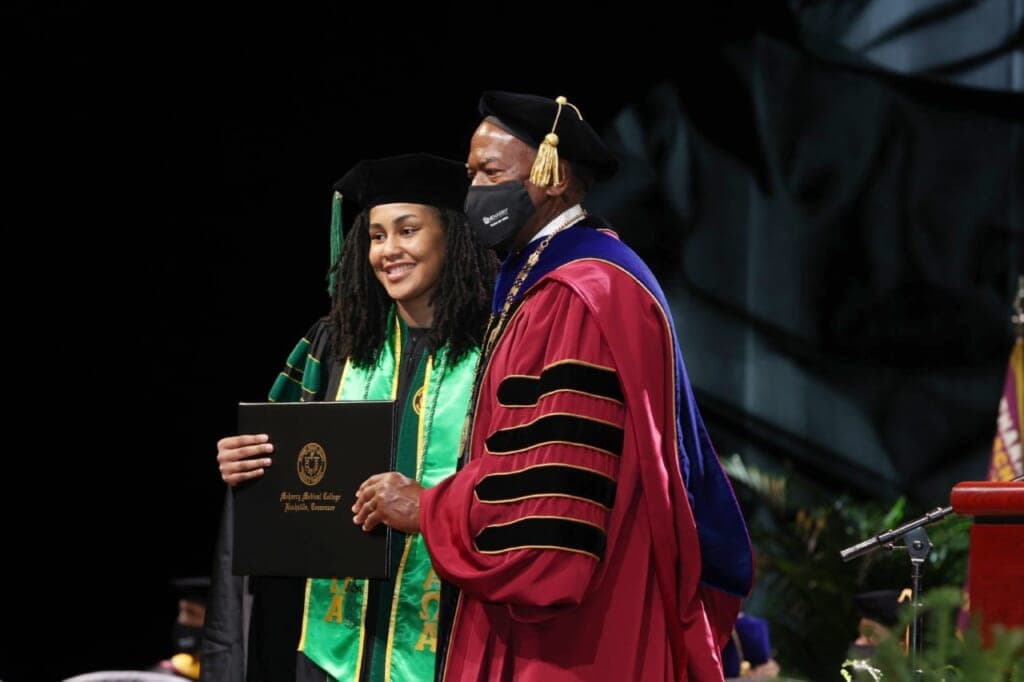Zindzi Thompson stands beside Dr. James E.K. Hildreth, president and CEO of Meharry Medical College