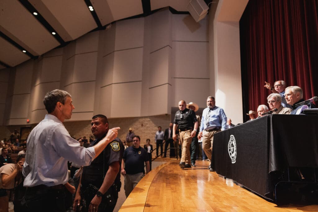Democratic gubernatorial candidate Beto O’Rourke interrupts a press conference held by Texas Gov. Greg Abbott