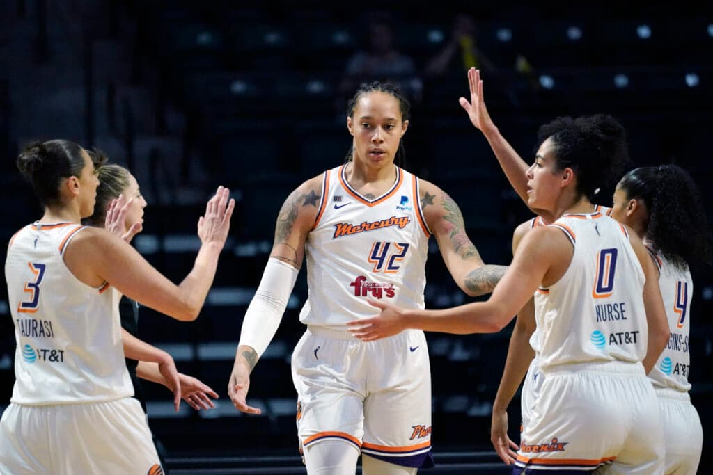 Phoenix Mercury’s Brittney Griner is congratulated