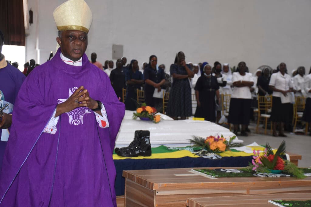 Mourners pay their respects