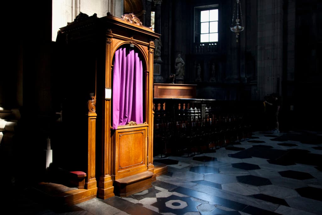 A  confessional booth in a Catholic church