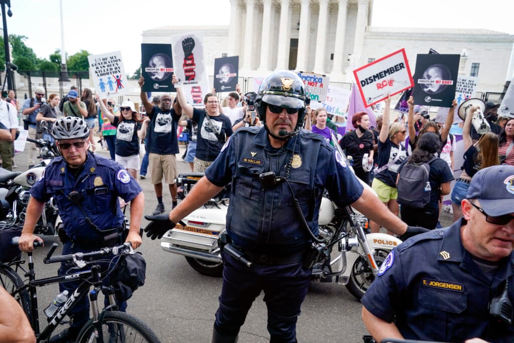 Police and protesters at the U.S Supreme Court