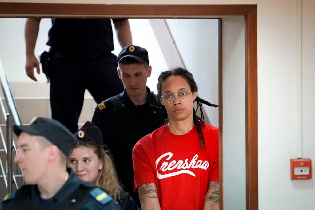 WNBA star and two-time Olympic gold medalist Brittney Griner is escorted to a courtroom in Russia