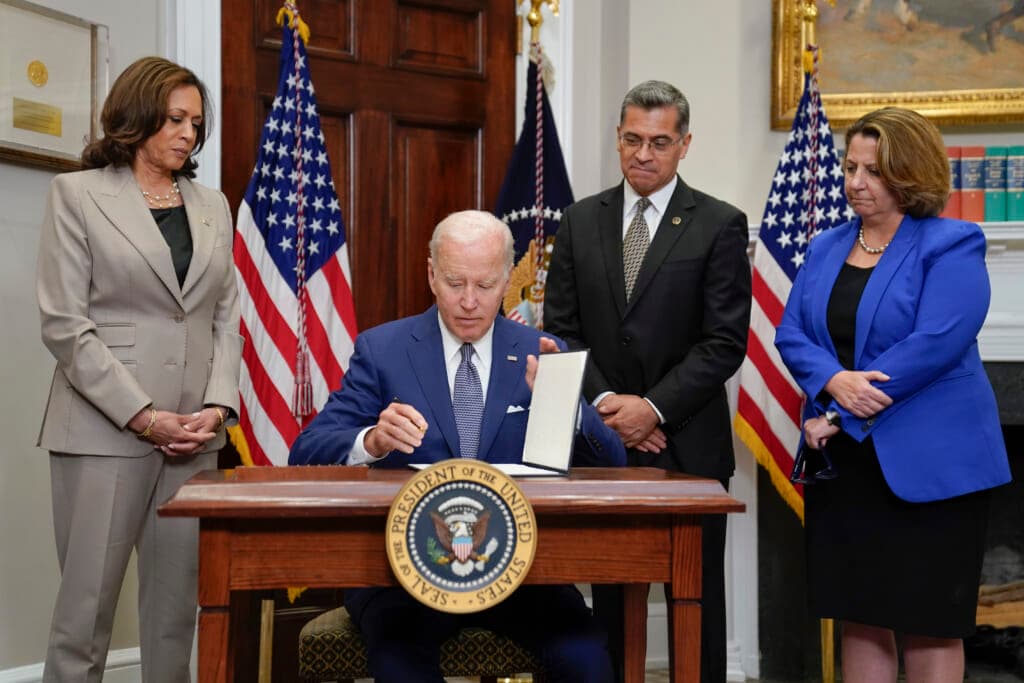 President Joe Biden signs an executive order on abortion access