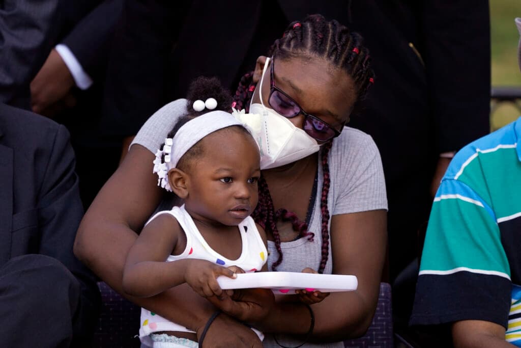 Starmanie Jackson holds her child, Gabriella