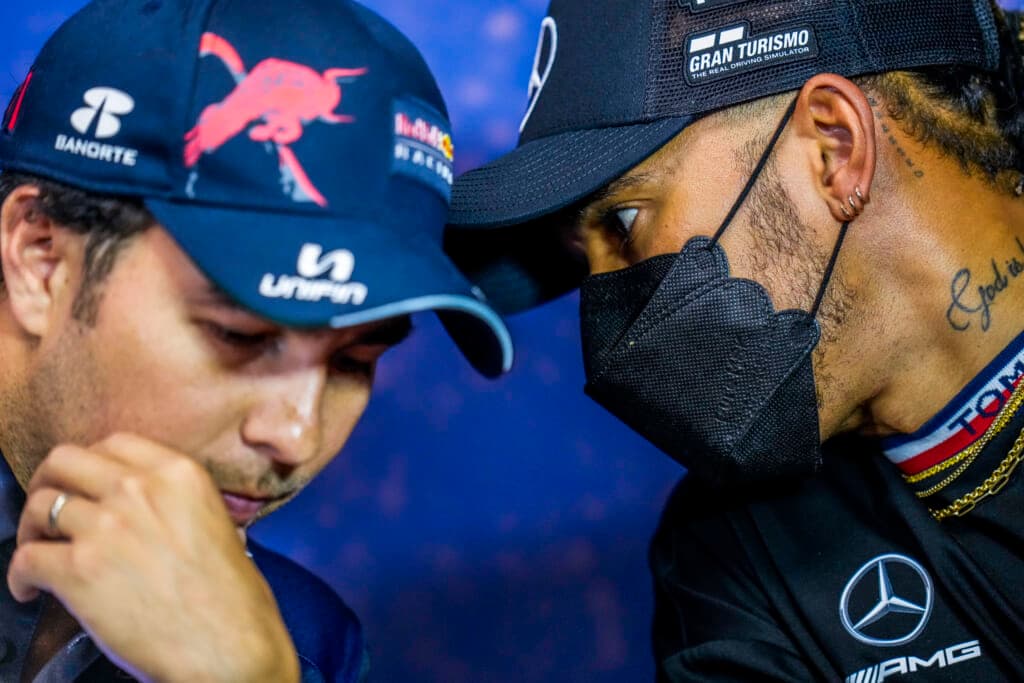 Red Bull driver Sergio Perez of Mexico and Mercedes driver Lewis Hamilton of Britain