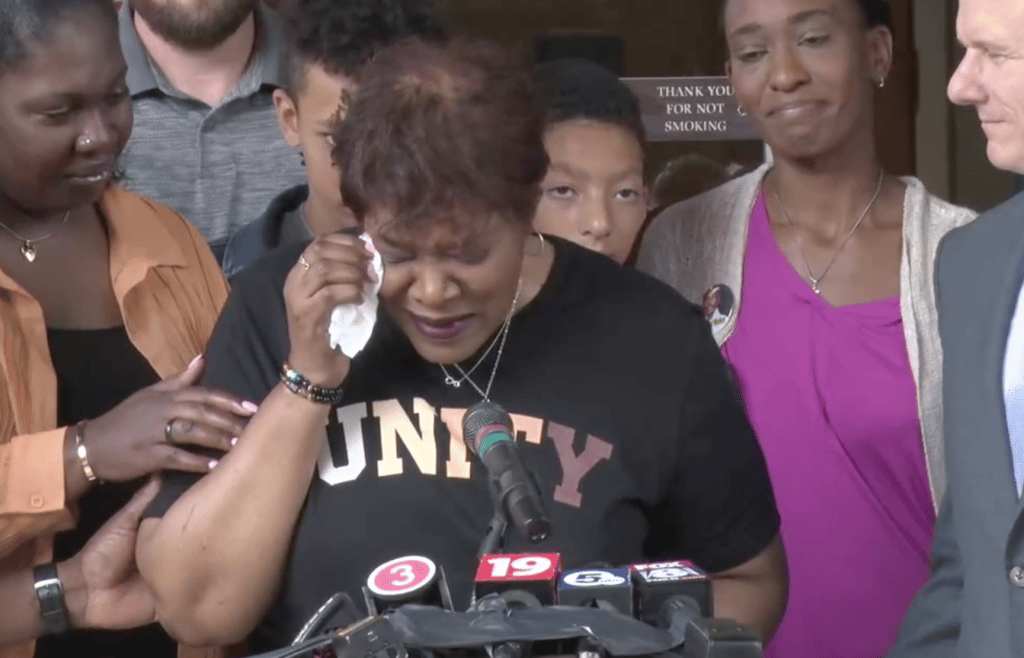 Pam Walker, mother of Jayland Walker, sobs as she recounts one of his childhood birthday parties