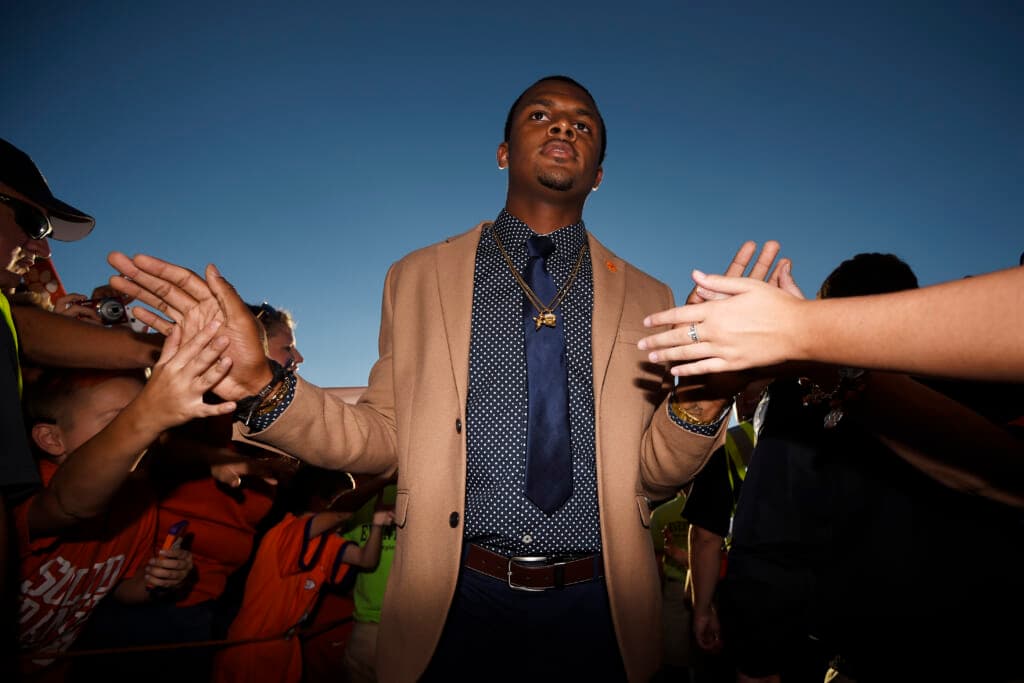 Cleveland Browns quarterback Deshaun Watson being greeted by fans