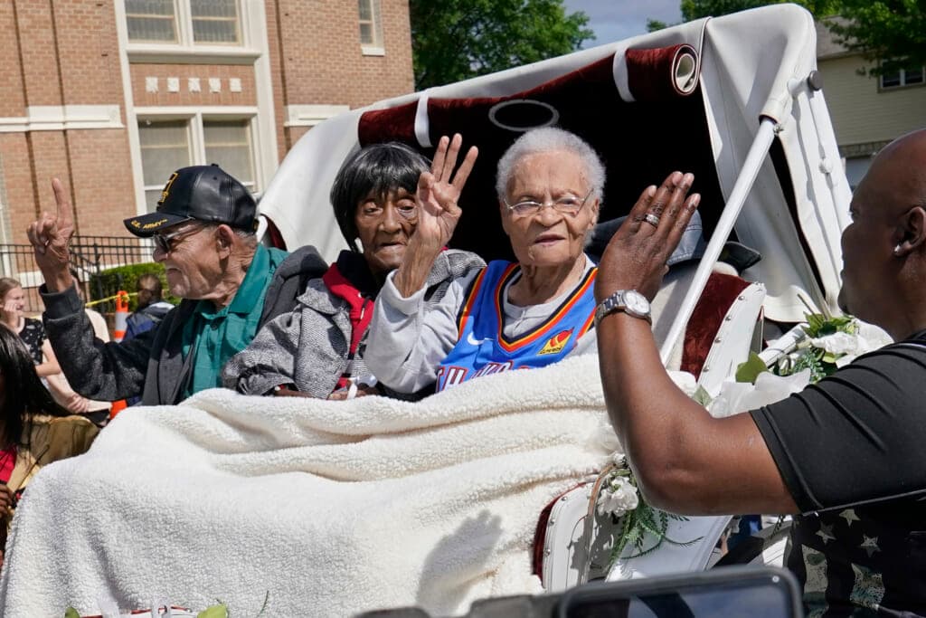 Tulsa Race Massacre survivors Hughes Van Ellis Sr., Lessie Benningfield Randle and Viola Fletcher