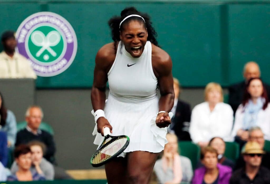 Tennis player Serena Williams holding a racket