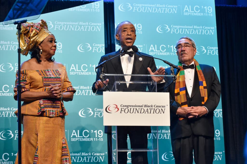Reverend Al Sharpton, center