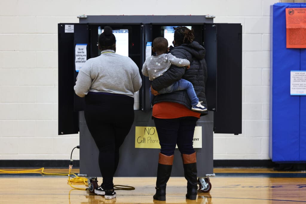 People cast their vote in the Georgia runoff election