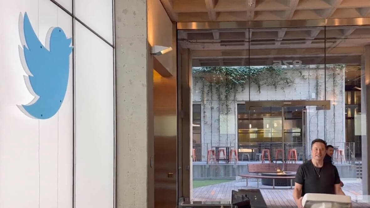 SpaceX CEO Elon Musk carries a sink in the lobby of Twitter Headquarters